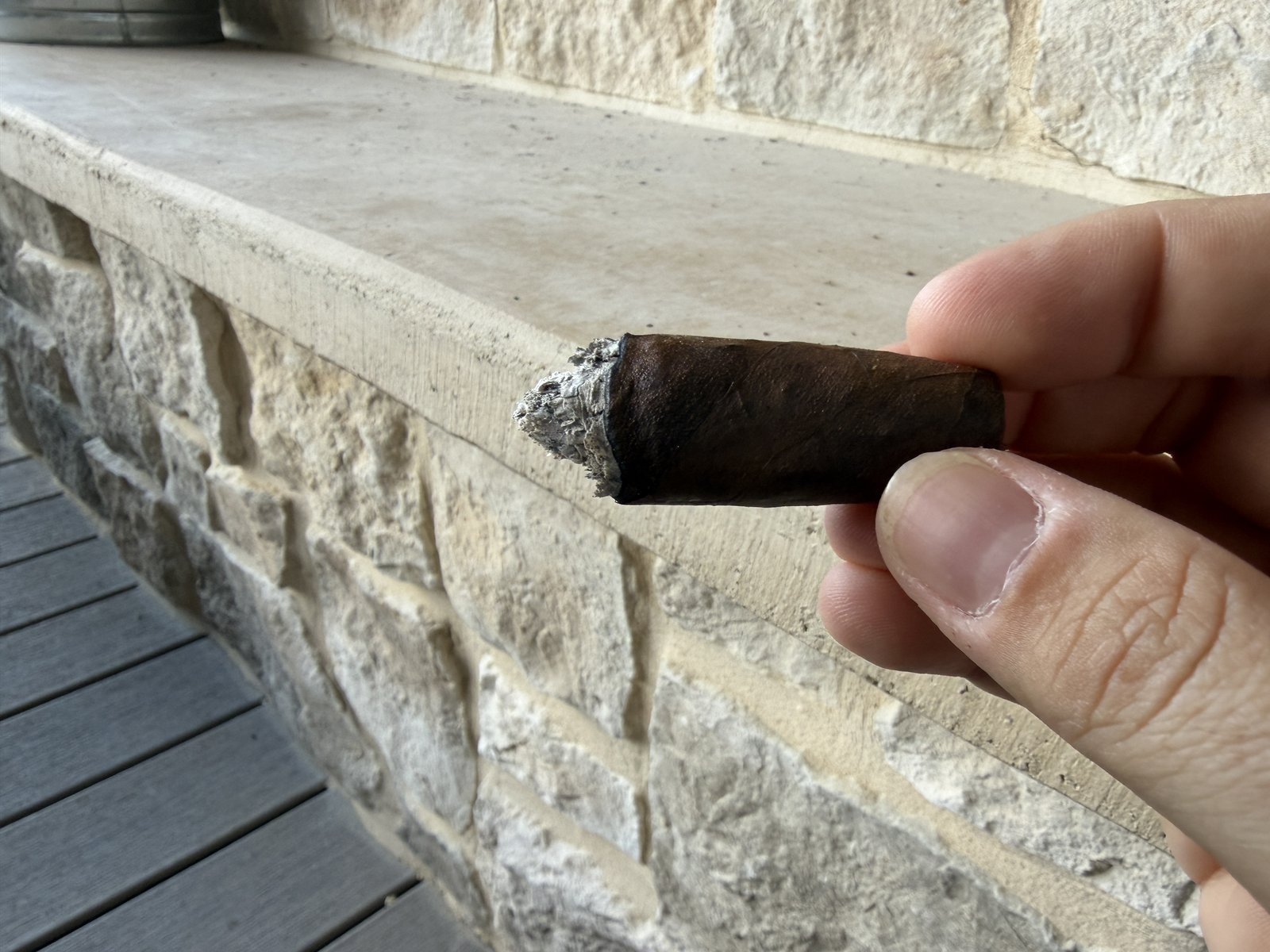 Nub of the Añejo Shark with a small ash point after a single tap