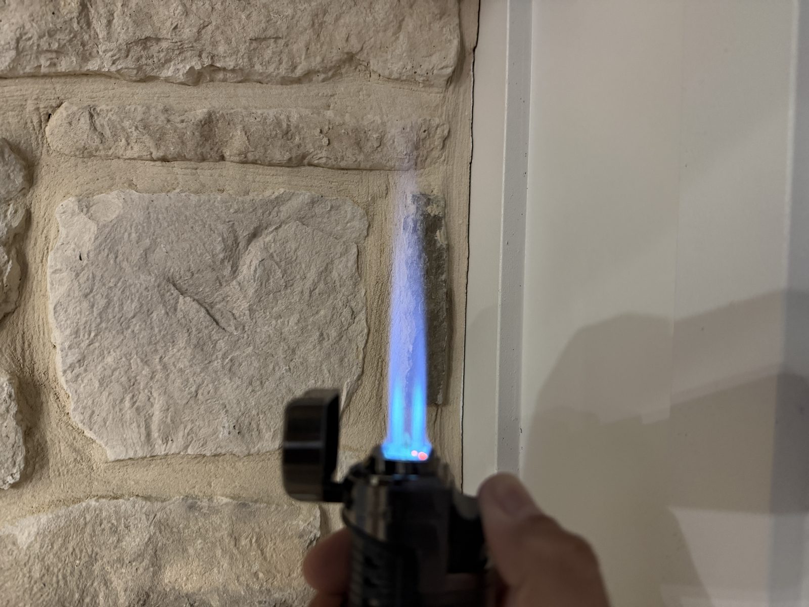 Jetline Mr. Fatboy lit with a tall blue quad flame several inches high