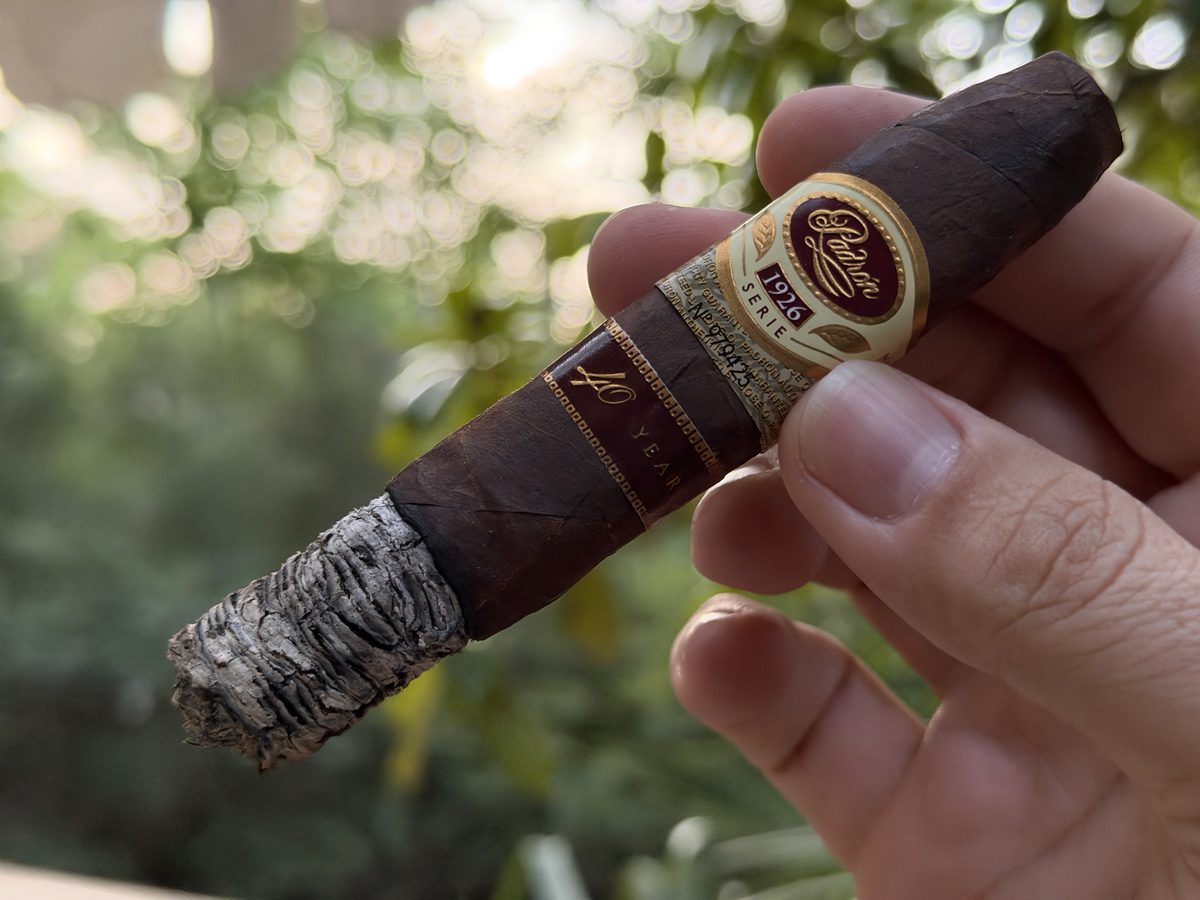 Padrón 1926 40th Anniversary lit with a long tight dime-stacked grey ash