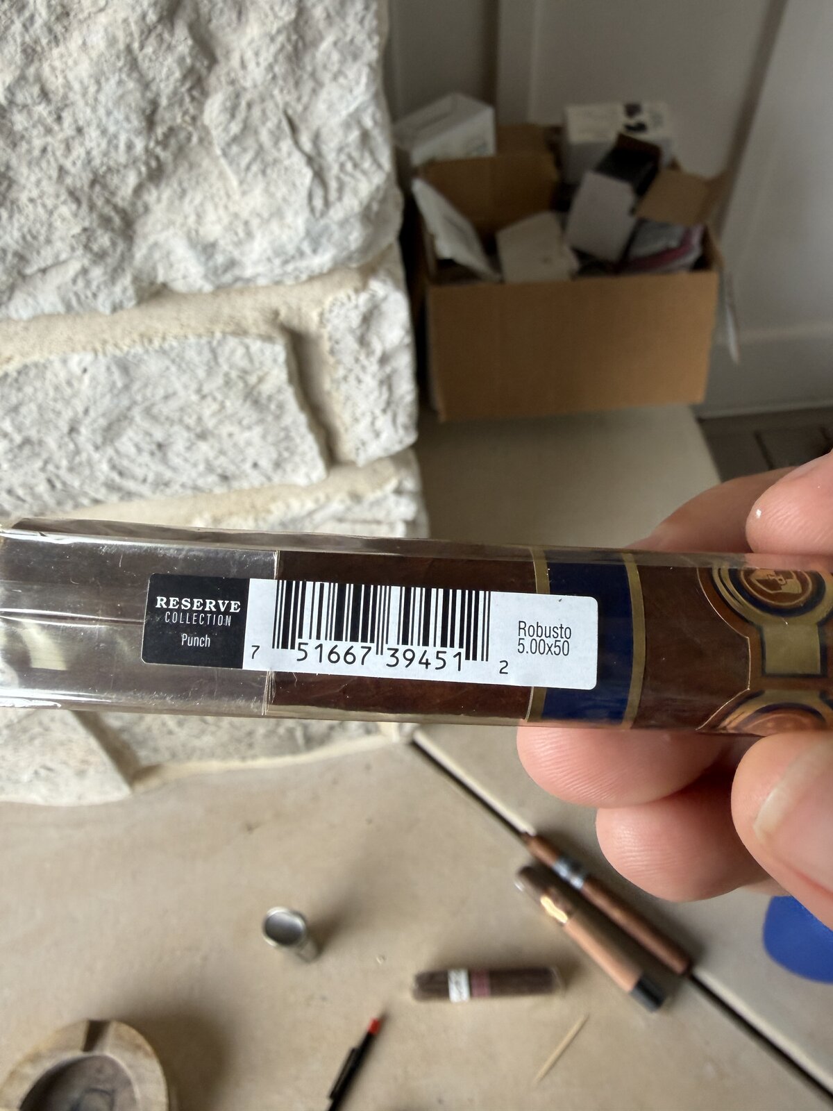 Punch Reserve Collection Robusto still in cellophane with a retailer sticker reading Robusto 5.00x50 Reserve Collection Punch