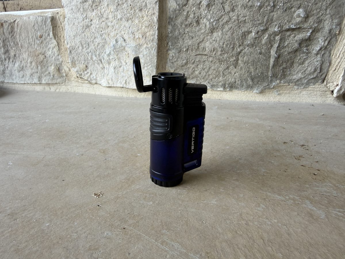 Vertigo Hawk with the cap flipped open showing the three torch jet ports inside